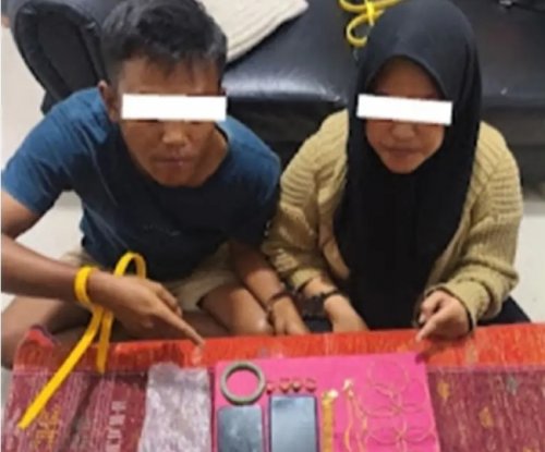 Pasangan tersangka penipuan.