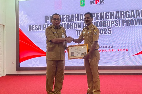 Kades Makmur, Kabupaten Pelalawan meraih apresiasi dari KPK.(foto: andi/halloriau.com)