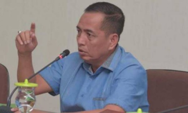 Mantan Wakil Ketua DPRD Riau, Asri Auzar ditahan di Polresta Pekanbaru (foto/ist)