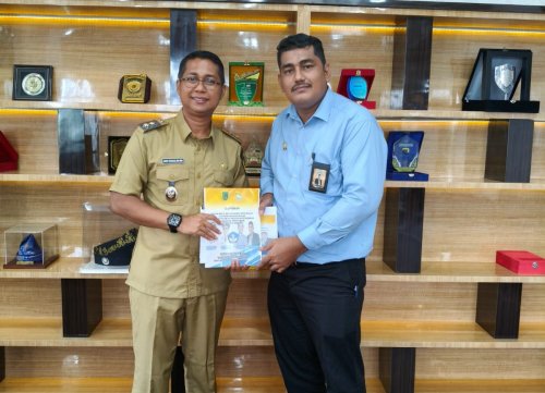Ketua Dewan Pendidikan Rohil, Gr.Azrul Arpan SE, MM bersama Wakil Bupati Rohil, Jhony Charles BBA, MBA (foto/afrizal)