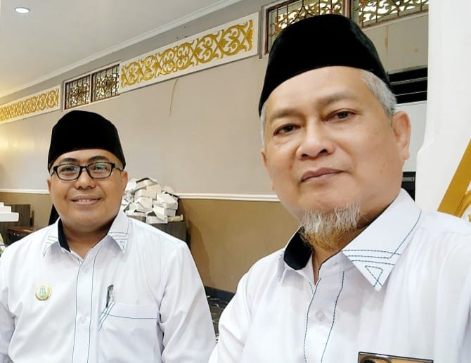 Ketua ASN PPPK Guru 2022 Provinsi Riau, Eko Wibowo (kiri) apresiasi Wako Pekanbaru (foto/ist)