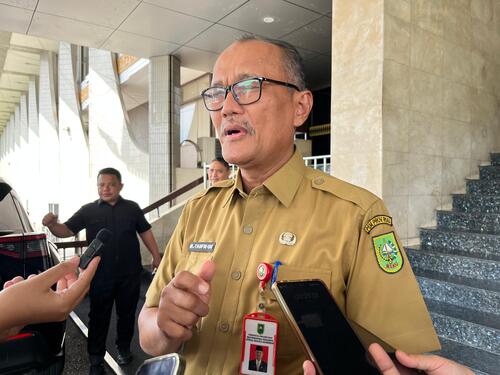 Kepala Disperindagkop UKM Riau, M Taufiq Oesman Hamid. (Foto: Fitri Yani)