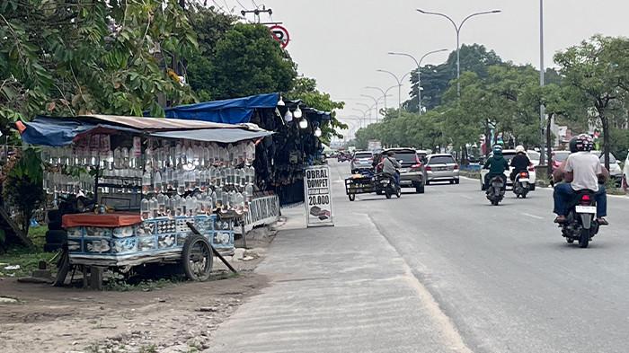 Ilustrasi PKL menjamur dan biang kemacetan di Pekanbaru (foto/tribunpekanbaru)
