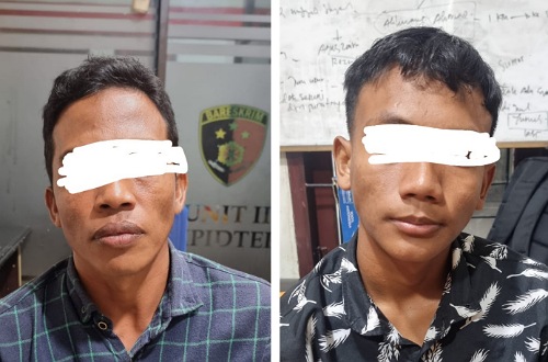 Dua tersangka pembakar lahan saat diamankan di Mapolres Pelalawan.(foto: andi/halloriau.com)
