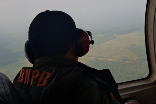 Pemantauan udara penanganan karhutla di Rohul. (Foto: Media Center Riau)