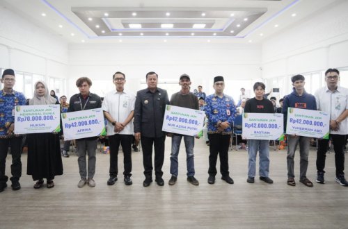 Apresiasi komitmen Bupati Kuansing, BPJS Ketenagakerjaan Cabang Rengat menyalurkan santunan Rp 2,7 miliar (foto/ultra)