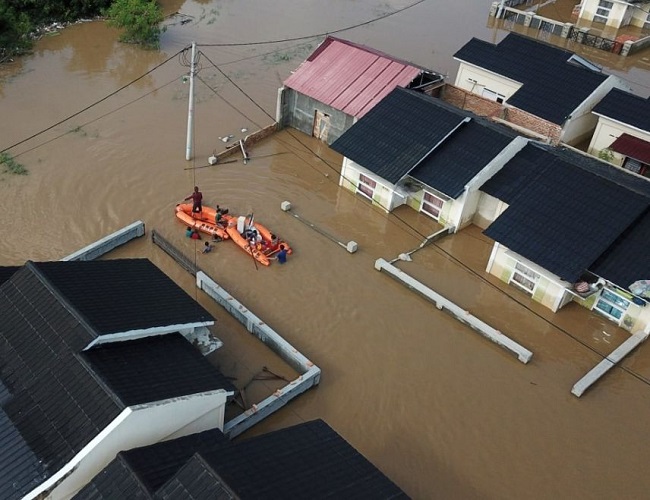 ilustrasi banjir di Perumahan Mande Villa, Pesona Harapan Indah, Pekanbaru, Riau.