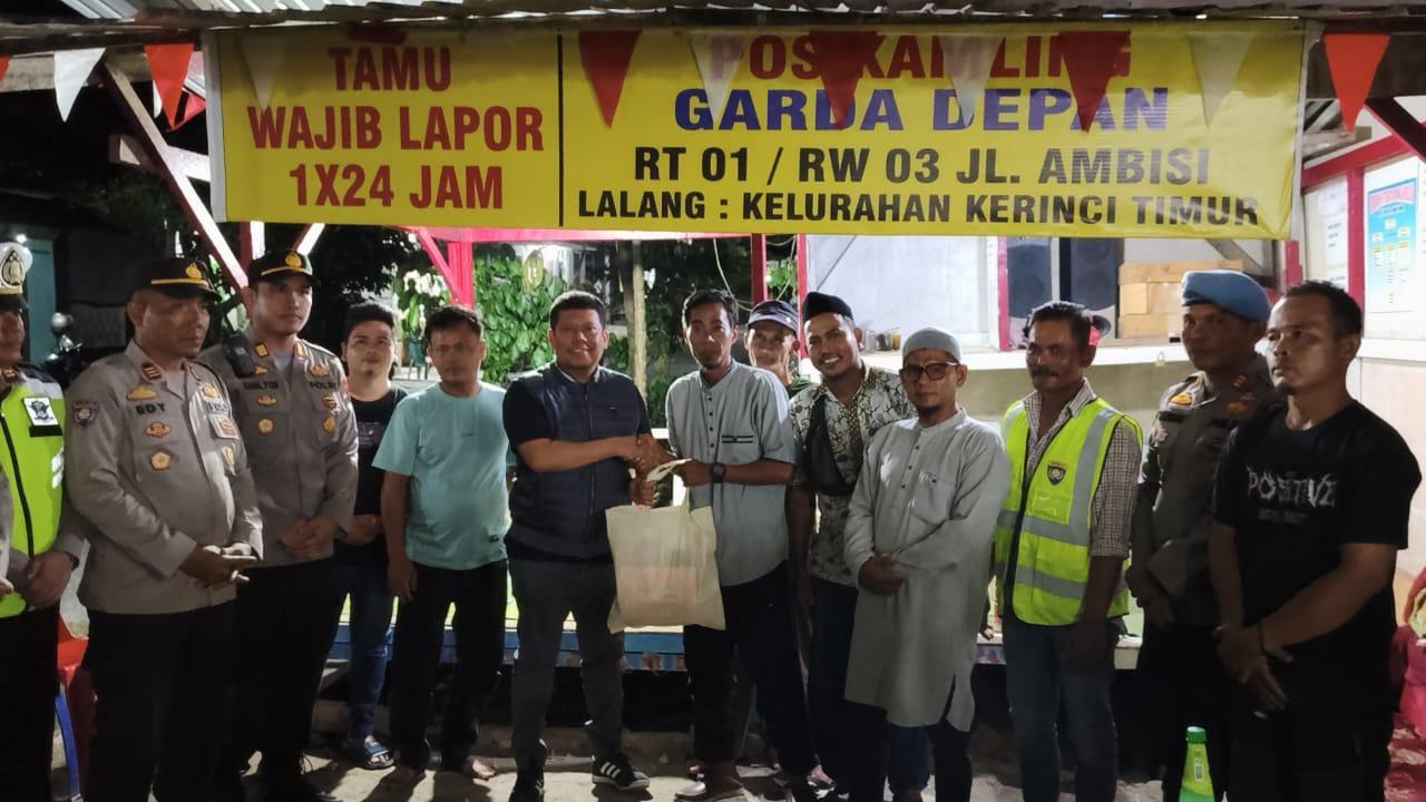 Kapolres Pelalawan, AKBP John turun langsung pimpin patroli malam jaga keamanan kota (foto/Andy)