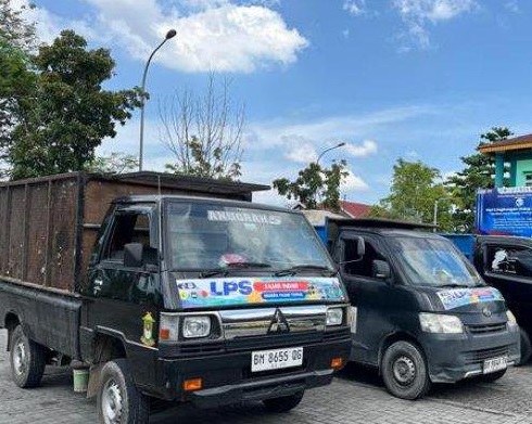 ilustrasi mobil angkut sampah,
