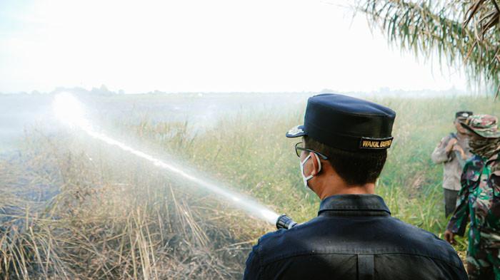 Warga Sungai Majo Rohil mengungsi, kabut asap Karhutla kian pekat (foto/tribunpku)