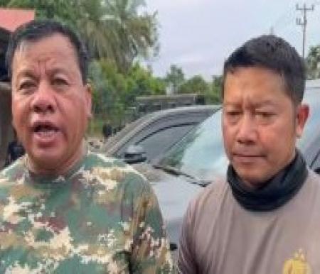 Bupati Kuantan Singingi Suhardiman Amby (kiri) bersama Kapolres Kuansing AKBP Ricky Pratidiningrat. 