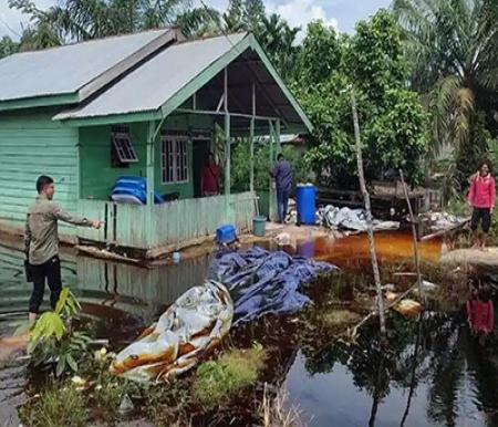 Banjir di Dusun Segintil, Siak.(foto: tribunpekanbaru.com)