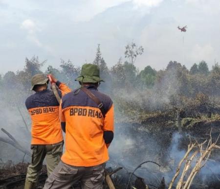 BPBD Riau semai garam di langit untuk cegah Karhutla (foto/rivo)