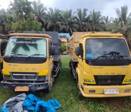 Dua truk dan 1 ton sawit disita polisi (foto/ist)