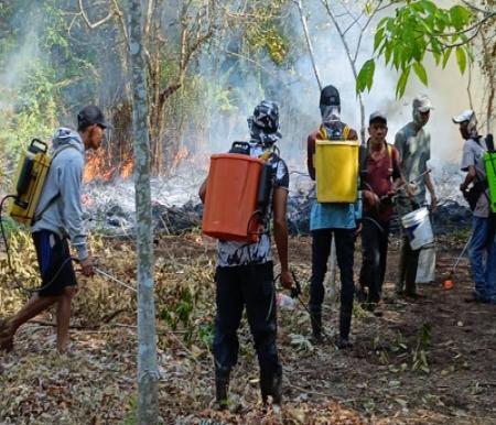 Pemadaman karhutla di Bengkalis.(foto: int)