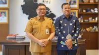 Sekdaprov Riau, Syahrial Abdi dan Bupati Kuansing, Suhardiman Amby.(foto: int)