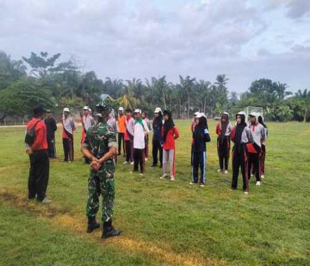 TMMD ke-125 Kodim 0321/Rokan Hilir menggelar kegiatan non-fisik berupa turnamen sepak bola di Lapangan Sepak Bola Rimba Jaya. (Foto: Afrizal)