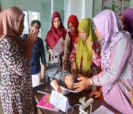 Asian Agri dan Tanoto Foundation perkuat kapasitas kader Posyandu di Kecamatan Pelalawan untuk cegah stunting (foto/ist)